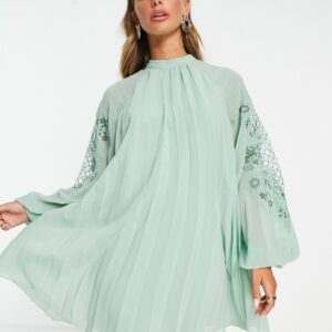 ASOS DESIGN pleated babydoll mini dress with oversized cutwork sleeve in pale green