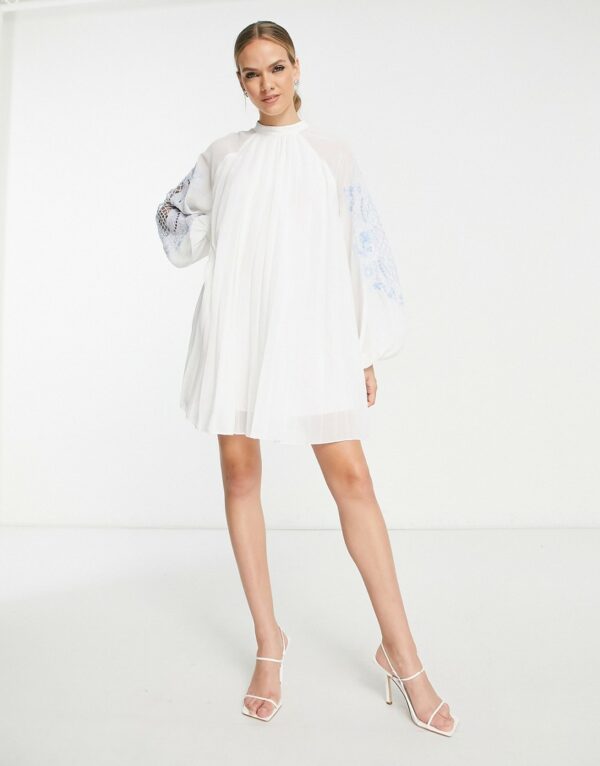 ASOS DESIGN pleated babydoll mini dress with oversized cutwork sleeve in white