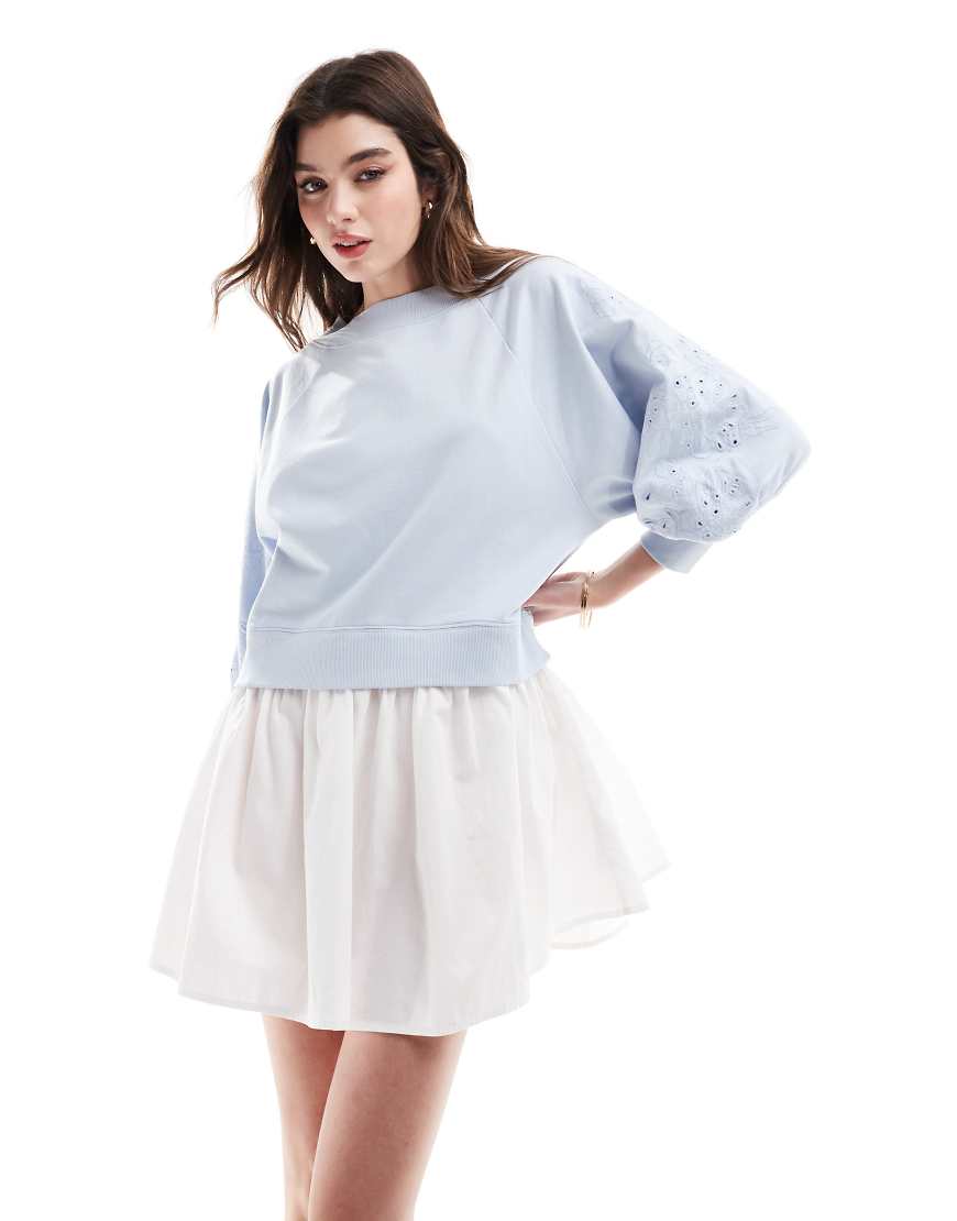 ASOS DESIGN sweatshirt mini dress with poplin skirt and embroidered sleeves in light blue wash