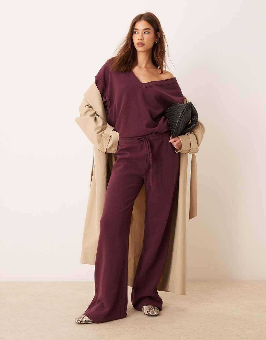 ASOS DESIGN waffle flared pants in burgundy - part of a set