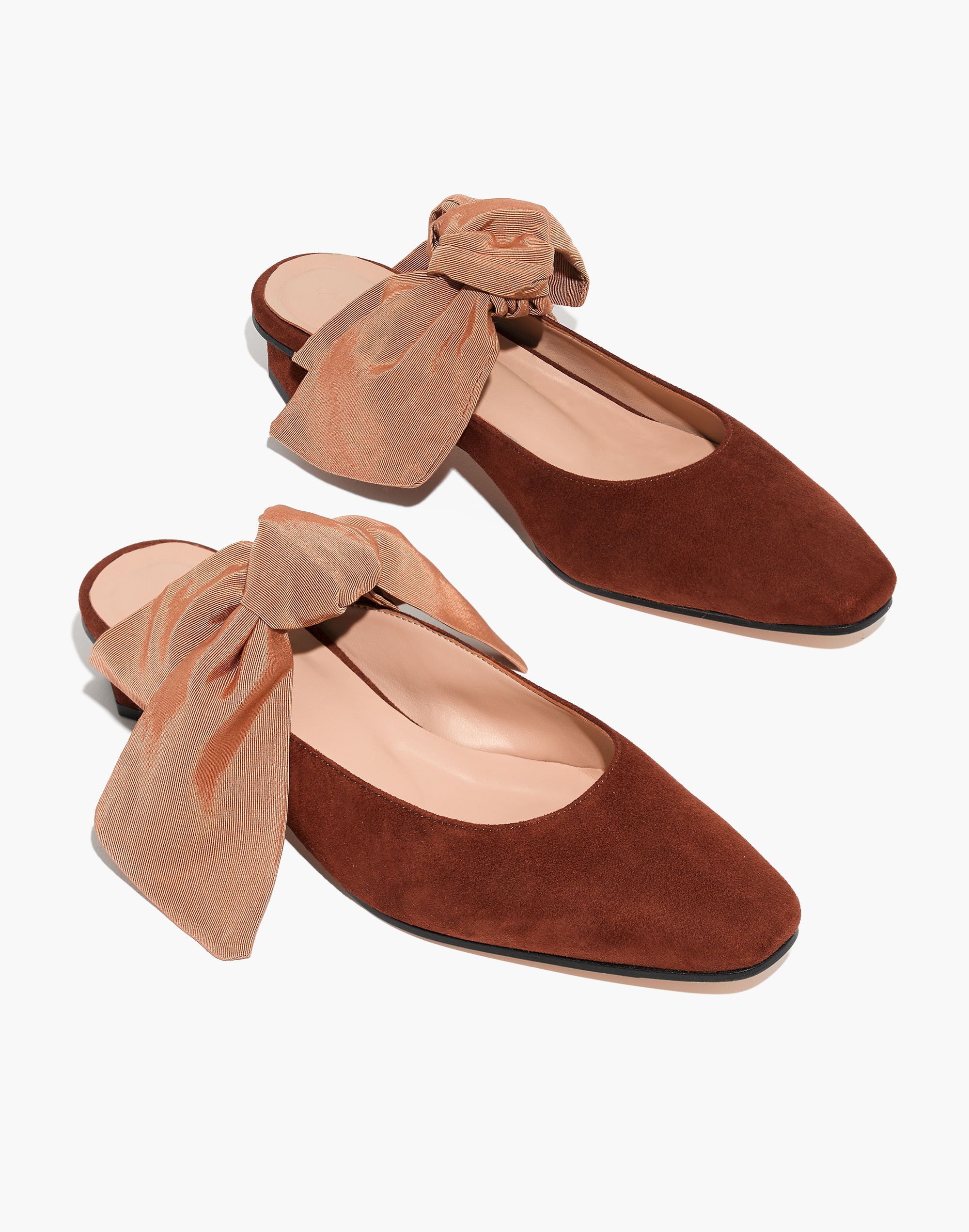 About Arianne Tina Suede Bow Mules