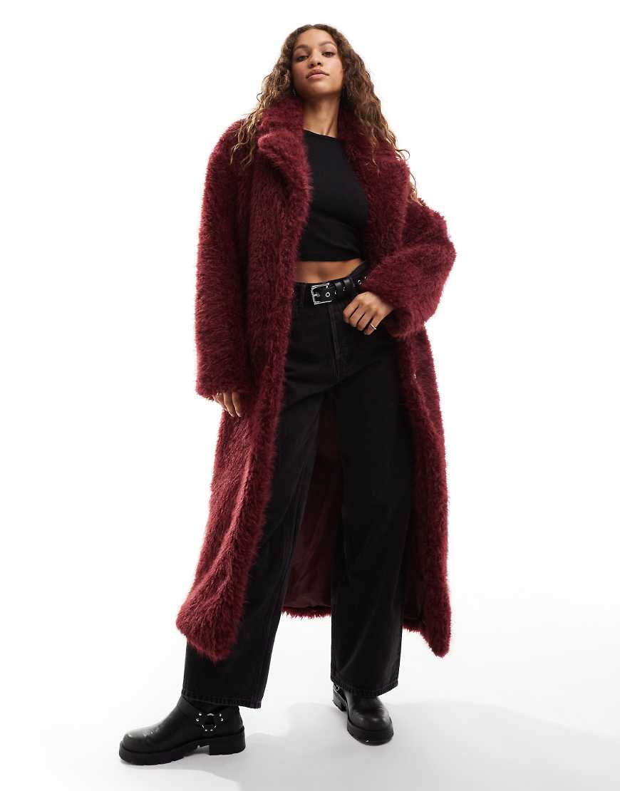 COLLUSION longline maxi faux fur coat in burgundy-Red