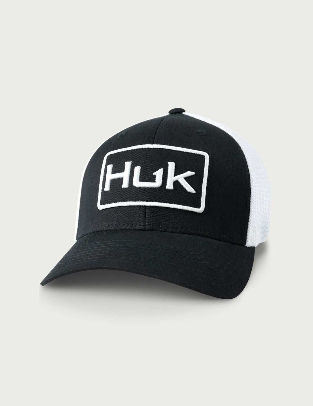 HUK Gear Logo Stretchback Trucker Hat in Black