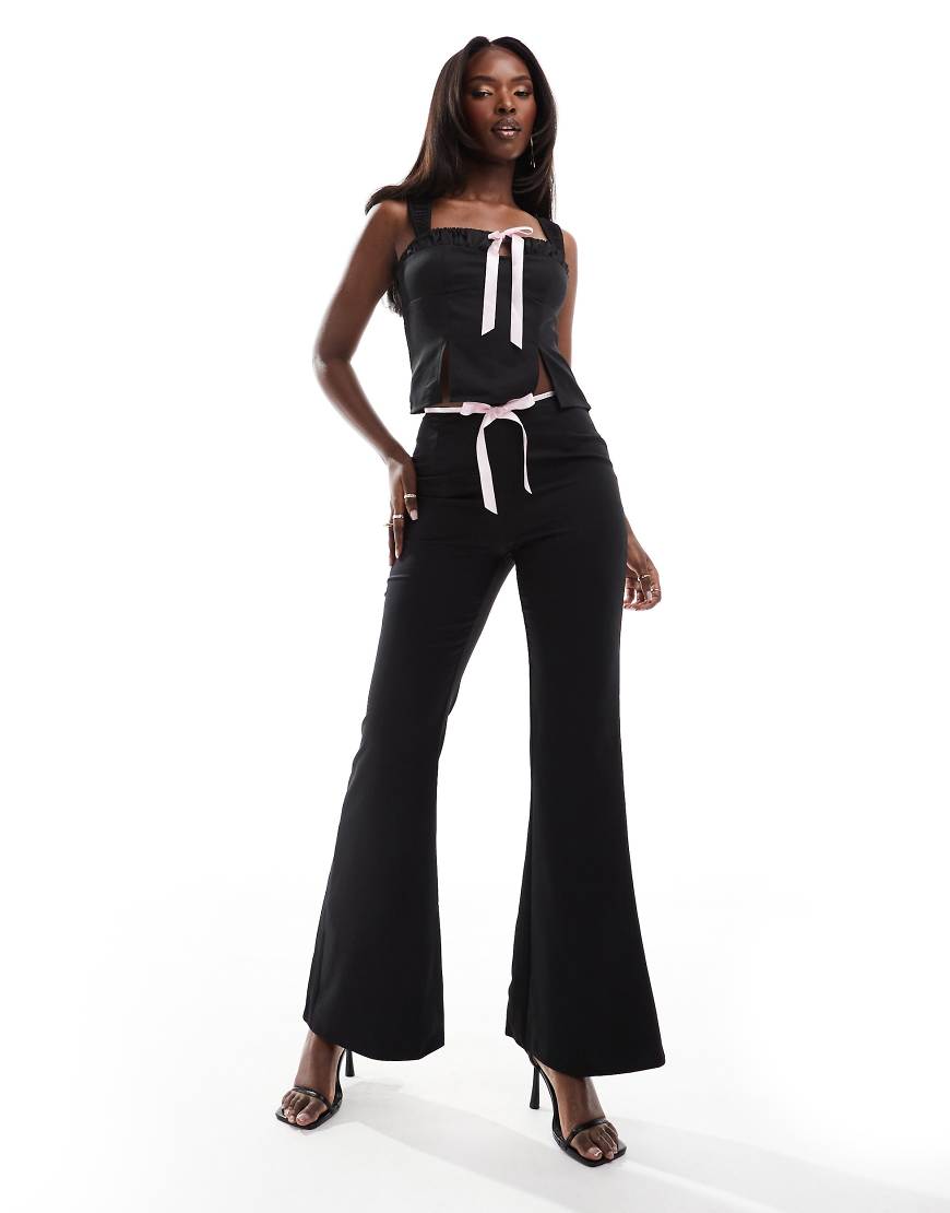 Kaiia ribbon bow front flared pants in black - part of a set