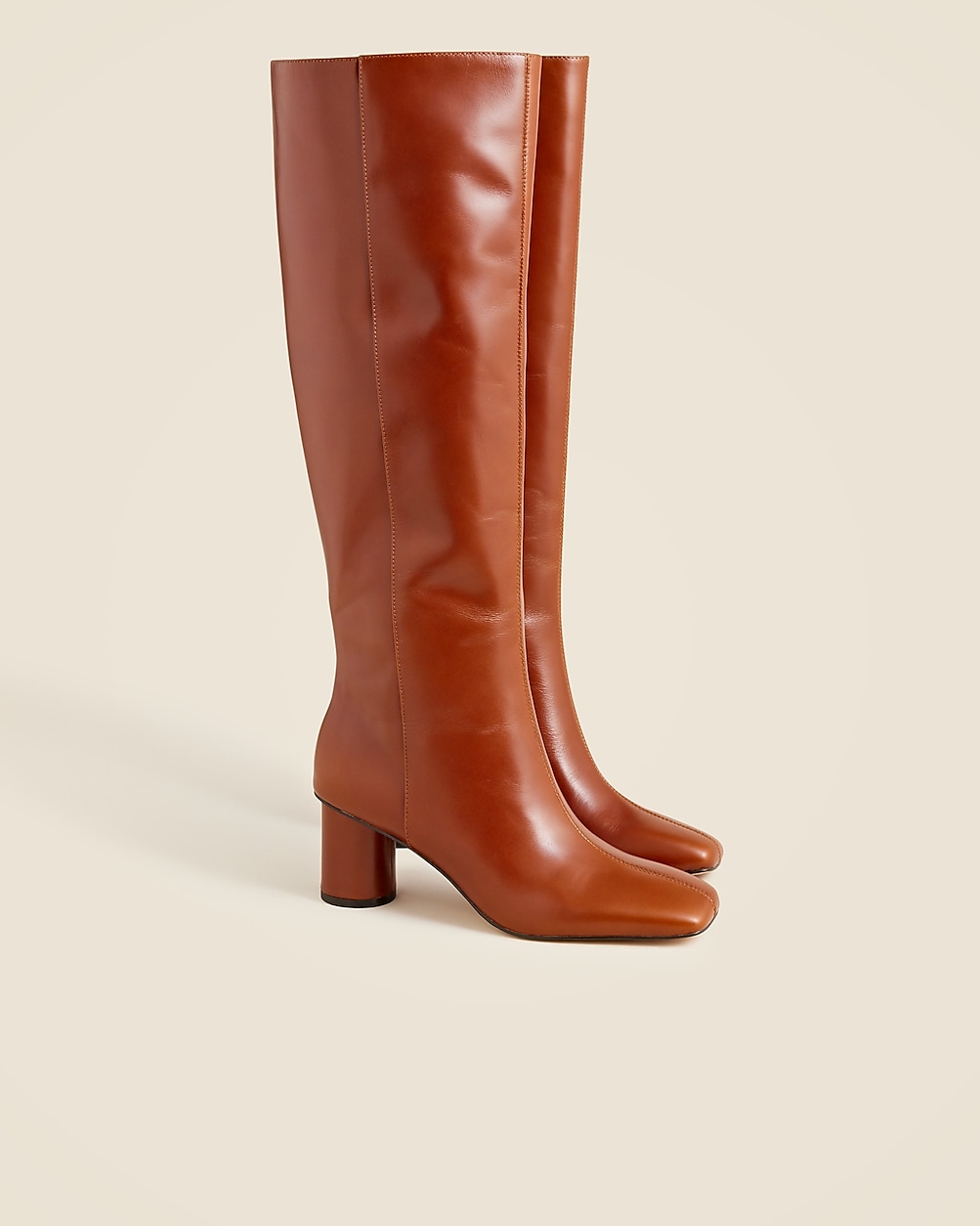 Knee-high round-heel boots in leather