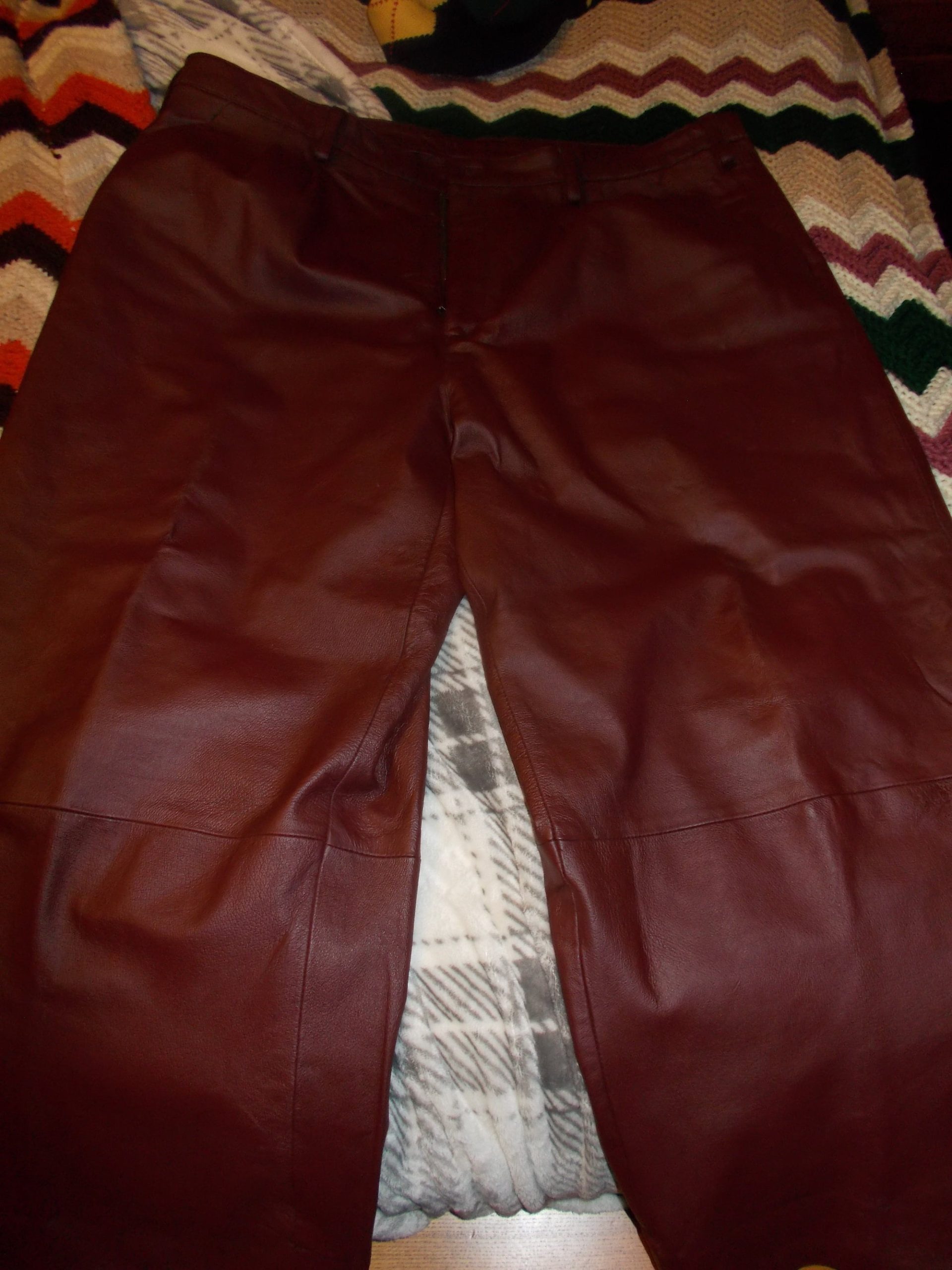 Mans Maroon Colored Leather Pants, 44 By 27.5 Inseam With A Tall Rise Of 14.5, Very Gently Used