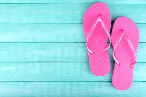 Photographic Print: Bright Flip-Flops on Color Wooden Background by Yastremska: 12x8in