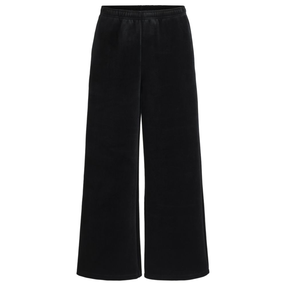 Relaxed-fit tracksuit bottoms in stretch velour