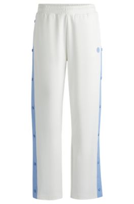 Stretch-cotton tracksuit bottoms with side tape- White Women's Tracksuits size M