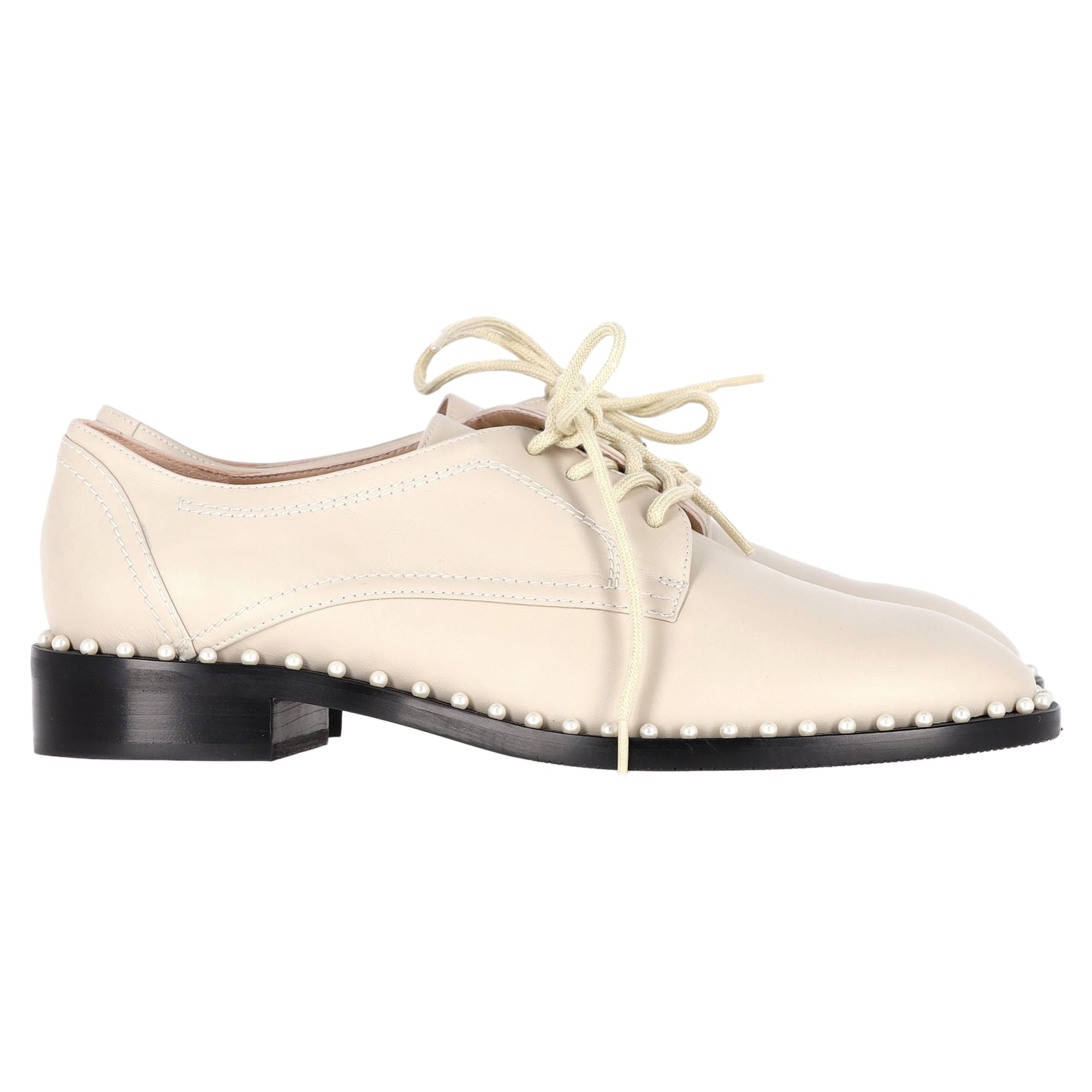 Stuart Weitzman Pearl Accent Brogues in Nude Leather