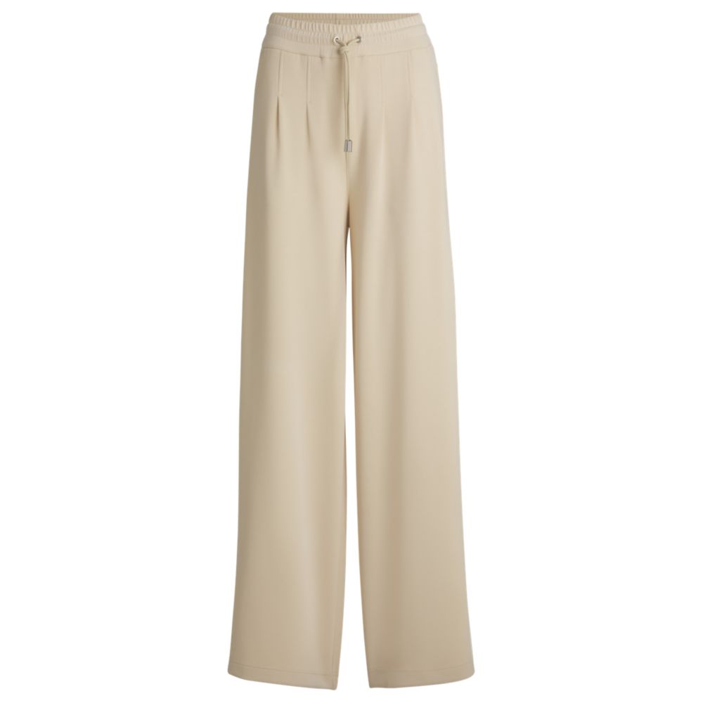 Wide-leg tracksuit bottoms with pleat details