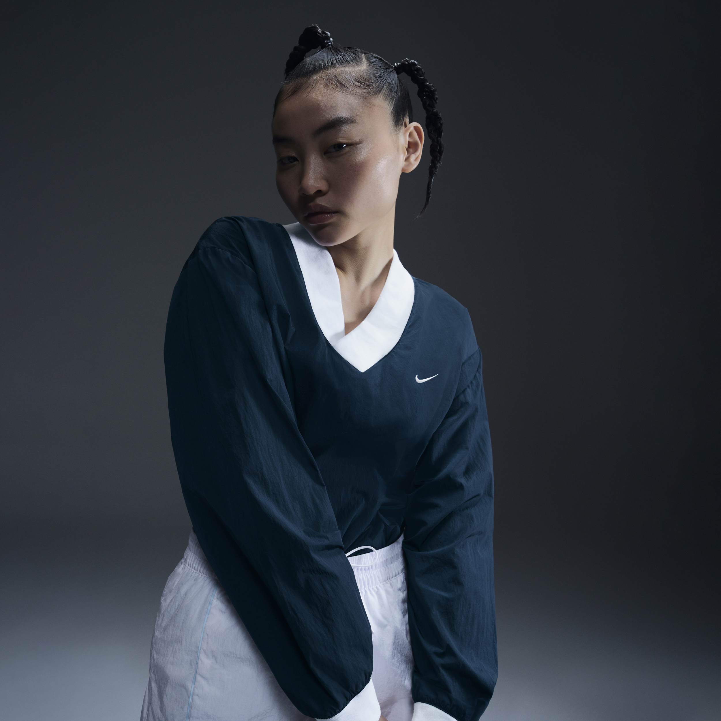 Women's Nike Sportswear Essential Loose UV Woven Long-Sleeve V-Neck Top in Blue | FV7649-480